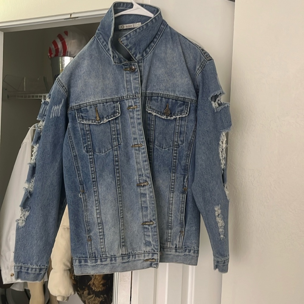 Oversized denim jacket with distressed arms
